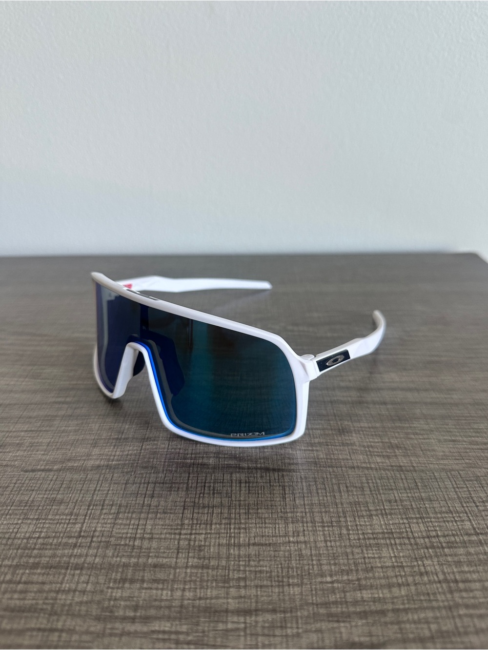 Oakley Men’s White Shield Sunglasses with Blue Lenses